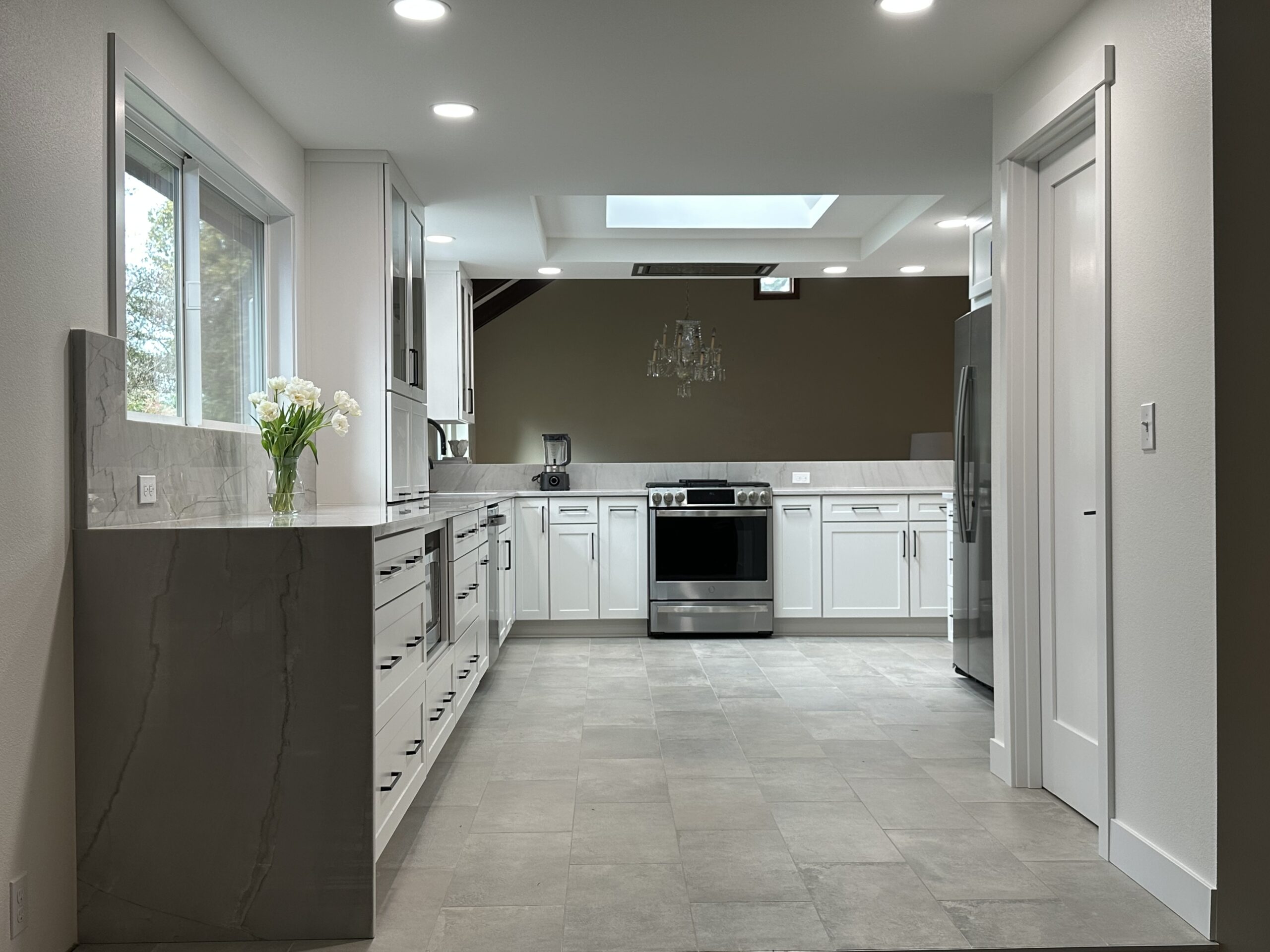 White Santorini quartzite countertops for a kitchen.