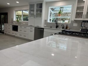 White Santorini quartzite countertops for a kitchen.