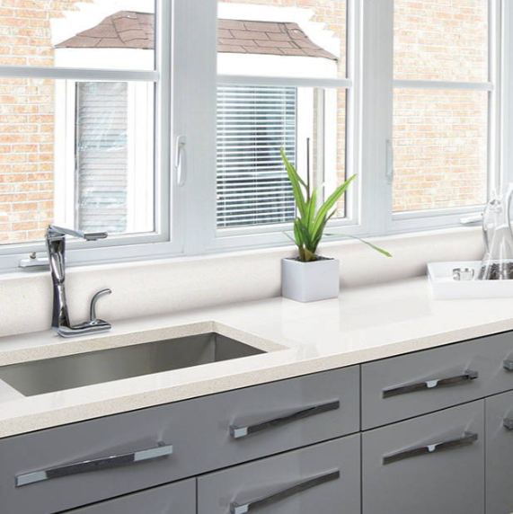 Simple frost white countertops will not break your countertop budget and provide a clean modern update to your kitchen or bath.