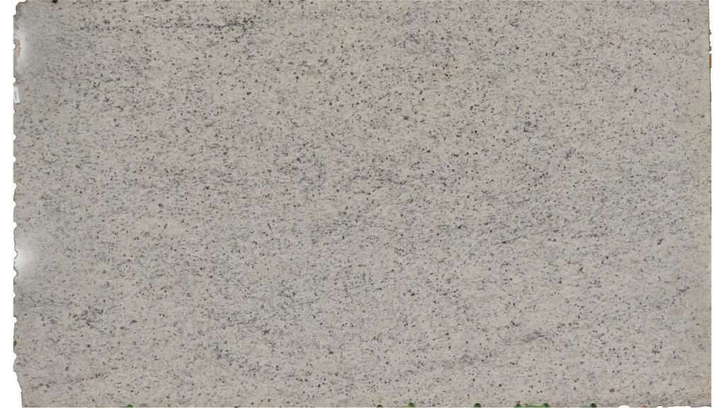 Close-up of a Dallas White granite slab showing its soft white background with subtle gray veining and burgundy specks.