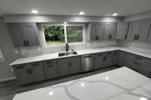 grey cabinets with white quartz kitchen countertops