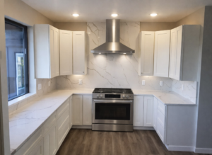 white quartz kitchen with full height backsplash