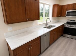 Modern kitchen with quartz countertop.