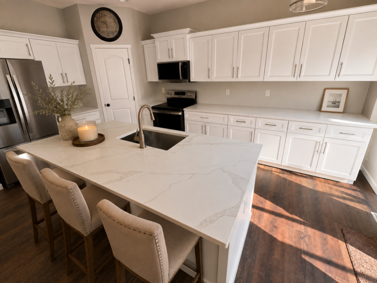 Modern kitchen with white countertops and white cabinetry